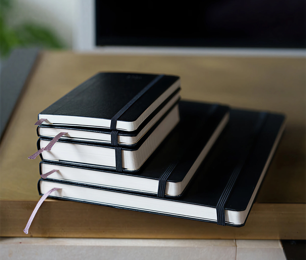 Rôzne formáty diára Moleskine 2026 – Pocket, Medium, Large a XL vedľa seba