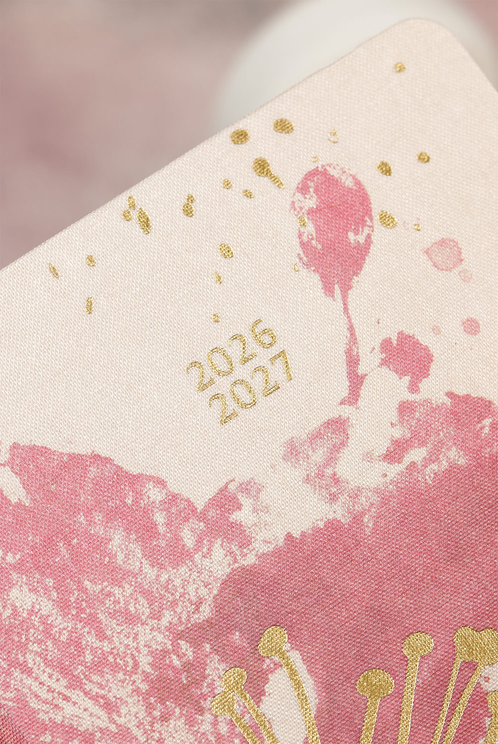 detail obálky potiahnutej látkou Moleskine Sakura, štruktúra materiálu